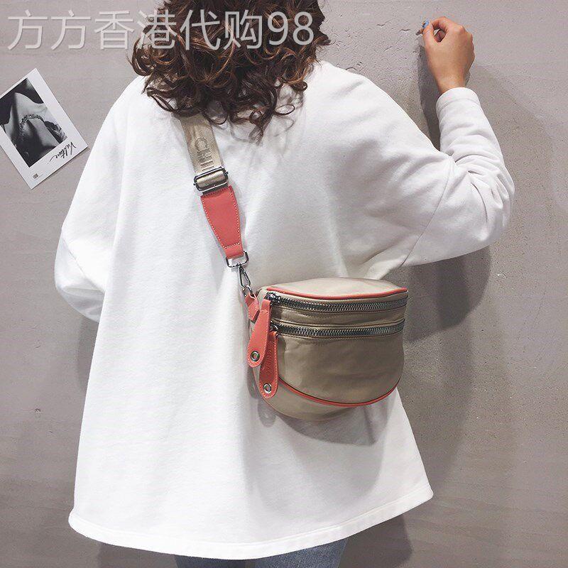 新加坡女包高级感斜挎包2026新款时尚个性百搭防泼水牛津布马鞍包