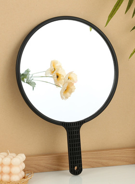 Barber holding makeup mirror, beauty salon holding mirror,
