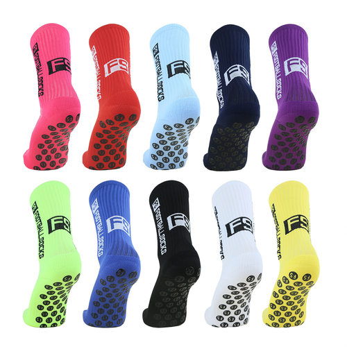 Professional sports football socks with adhesive on the sol