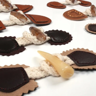 大衣皮衣亚克力皮牌装 爆款 树脂真皮对扣 童装 饰扣辅料 仿皮牛角扣