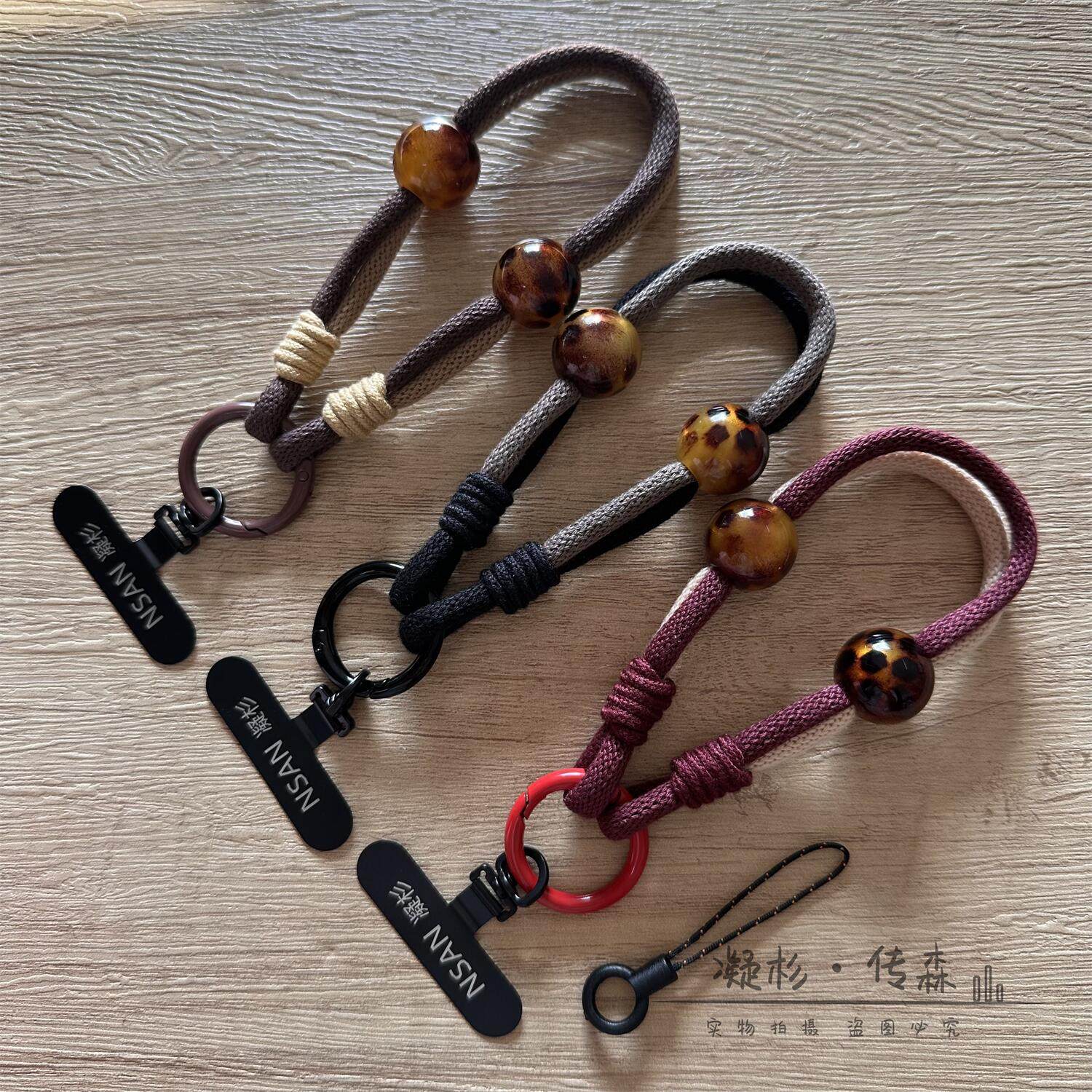 秋冬美拉德金属垫片手机挂绳新款豹纹串珠手腕绳挂件时尚高级短手绳棉绳腕带复古链吊绳网红女挂饰配件黑棕色,3C数码配件,手机挂件/手机链,淘宝优惠券,粉丝福利购,淘宝优惠卷