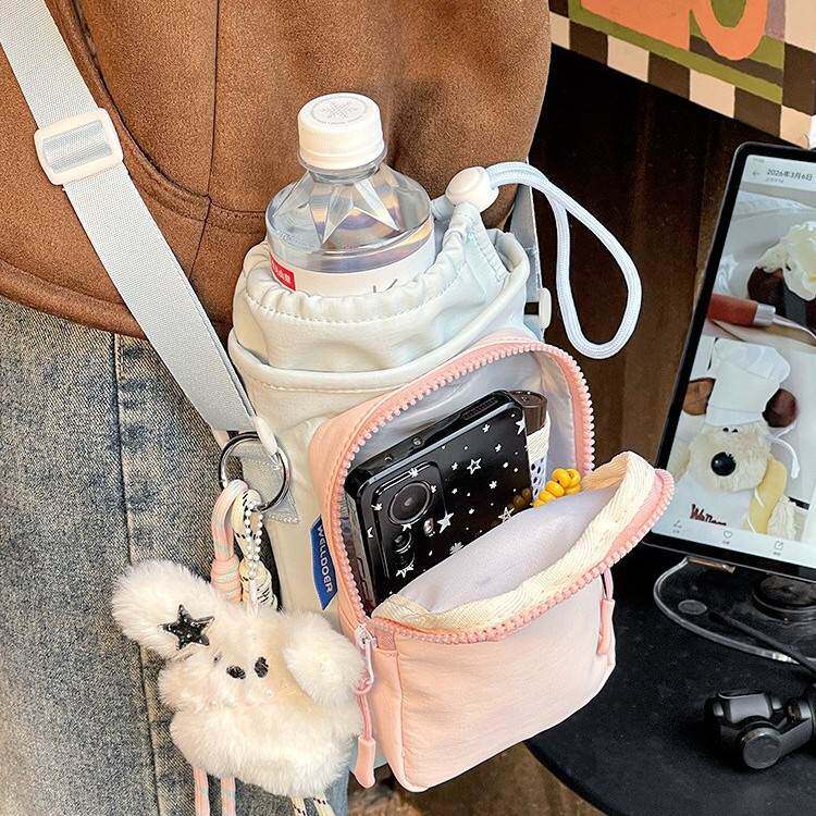 束口手机小跨包女生斜挎大疆相机收纳袋迷你小包包轻便2026新款