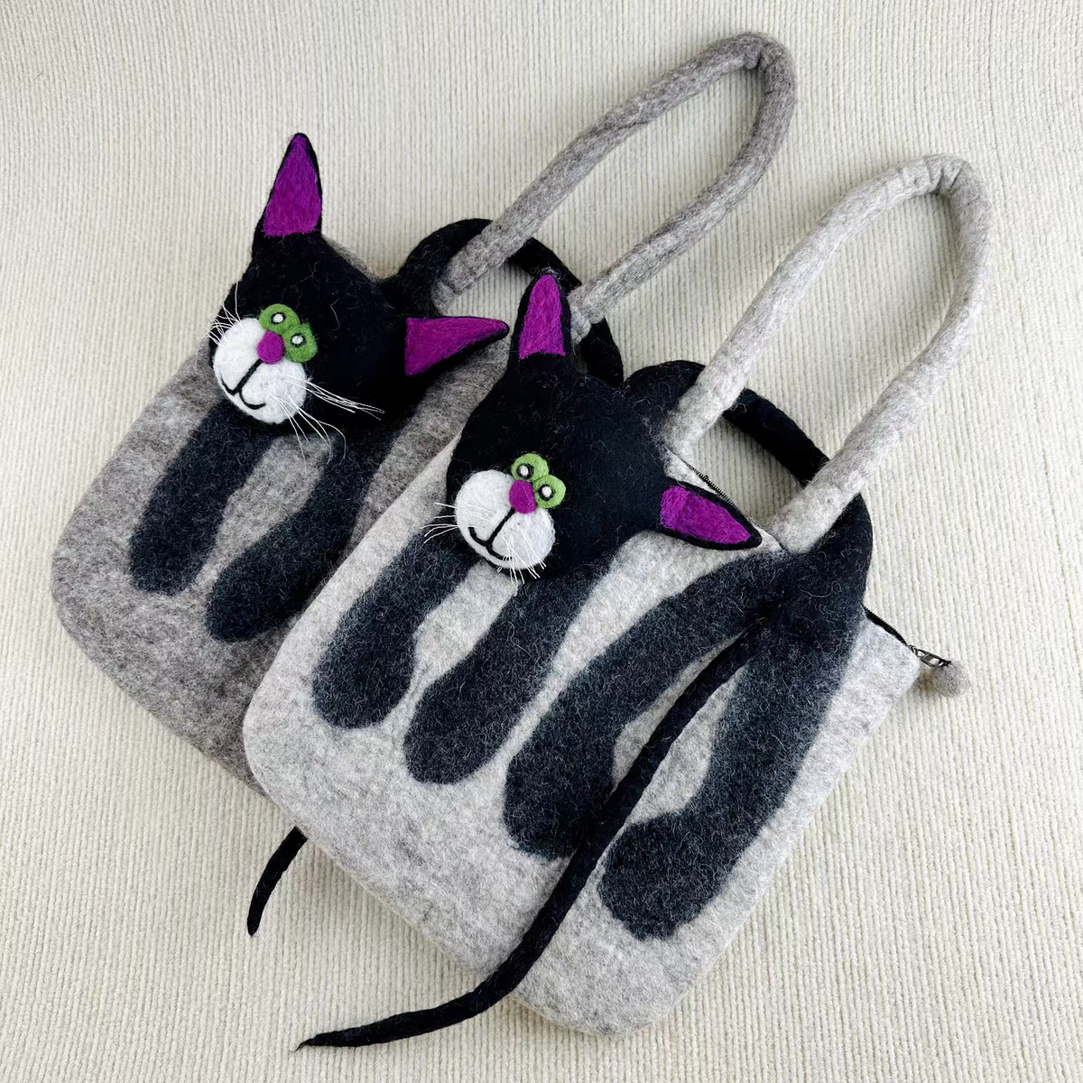 尼泊尔手工羊毛毡立体猫咪手拎包单肩包简约时尚小众设计师款