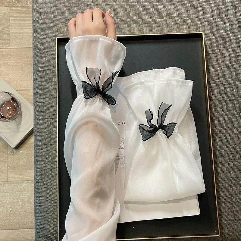 冰袖防晒冰丝女高弹宽松新款温柔风透气舒适凉爽冰丝袖套夏季薄款