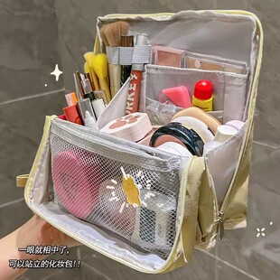 化妆包笔袋女2026新款分区可站立式大容量旅行外出手提便携式分格化妆刷收纳学生文具防水皮面高端外出洗漱包