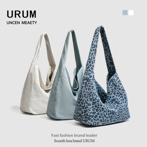URUM韩系包包女2025新款秋冬通勤帆布水桶包豹纹托特包单肩腋下包