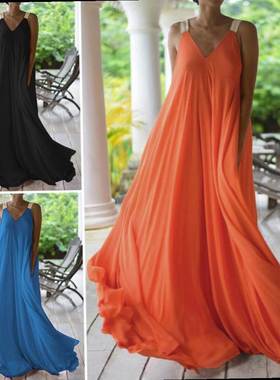 Full length dress with deep V-neck halter and large hem susp