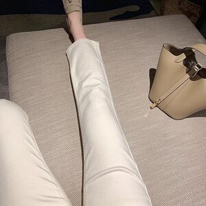 朵雅时尚直筒烟管牛仔裤女春秋2025新款修身弹力加绒八九分小个子