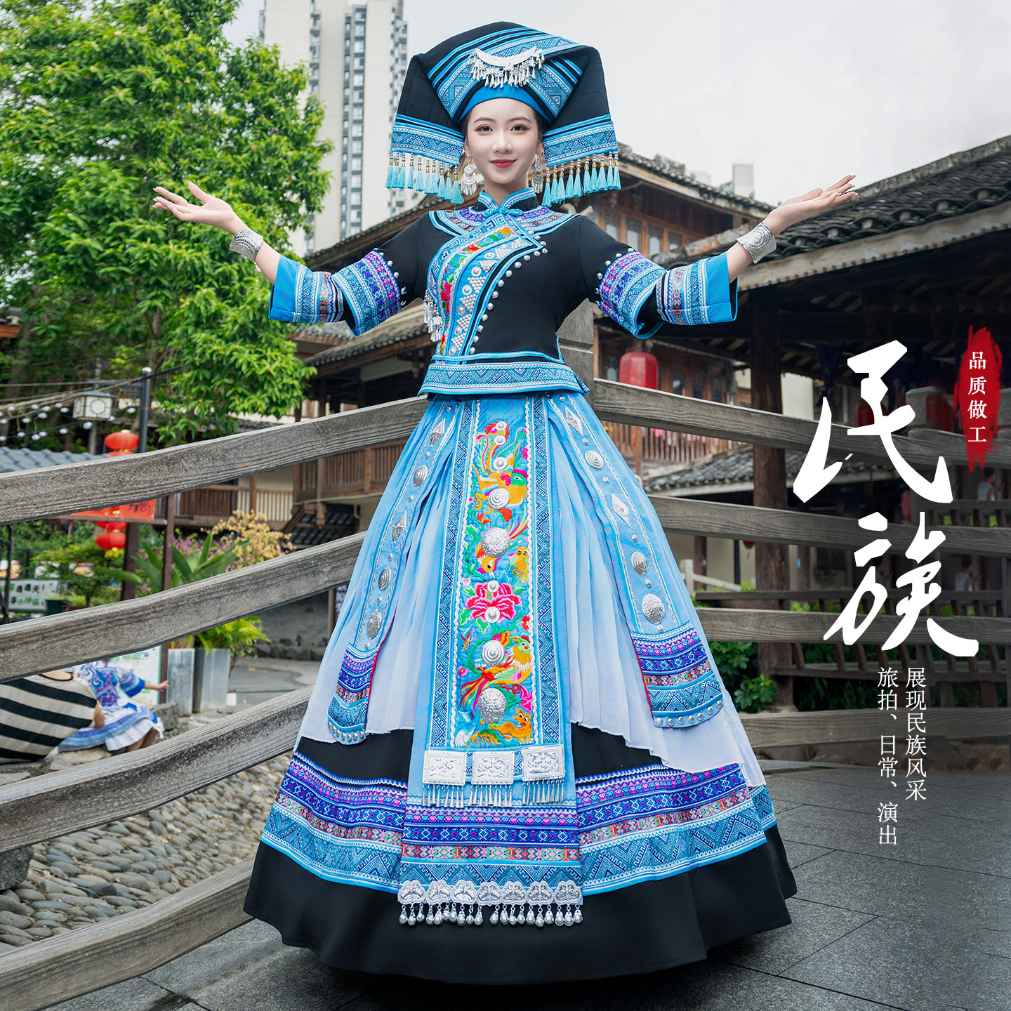 壮族三月三女刺绣长裙演出服图片