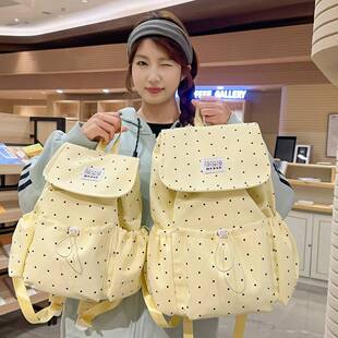 官方正品翻盖波点束带双肩包女学院风大学生通勤书包小众休闲旅行