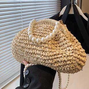 夏天时尚珍珠手提编织包女2025韩版新款简约休闲草编包百搭斜挎包