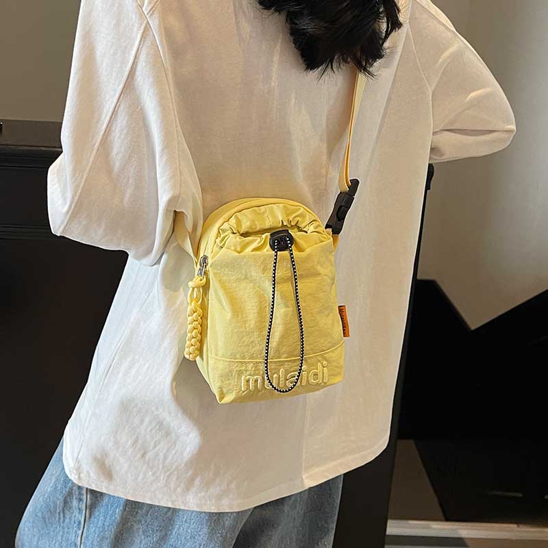 夏天手机包女斜挎2025新款迷你小包轻便水杯包帆布小跨包运动小包