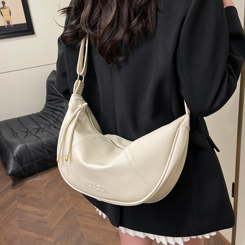 简约休闲大容量包包女2025新款高级质感百搭单肩包通勤斜挎饺子包