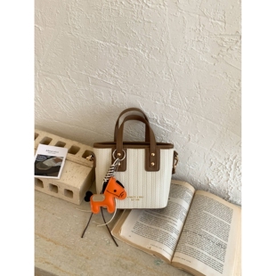 高档品牌今年流行手提水桶包女2026新款时尚通勤单肩包超火爆款斜