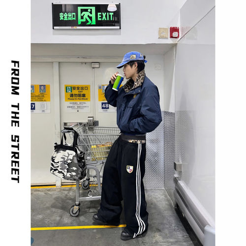 来自街头复古洗水破坏慵懒休闲运动刺绣徽章宽松baggy针织卫裤男
