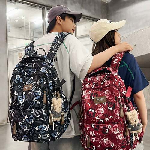 专柜品牌潮酷涂鸦字母情侣款个性吸睛双肩包青春活力感气垫款帅气