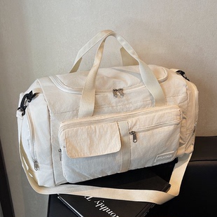 法国品牌短途旅行包可上飞机女士行李包男款旅游大容量运动健身包