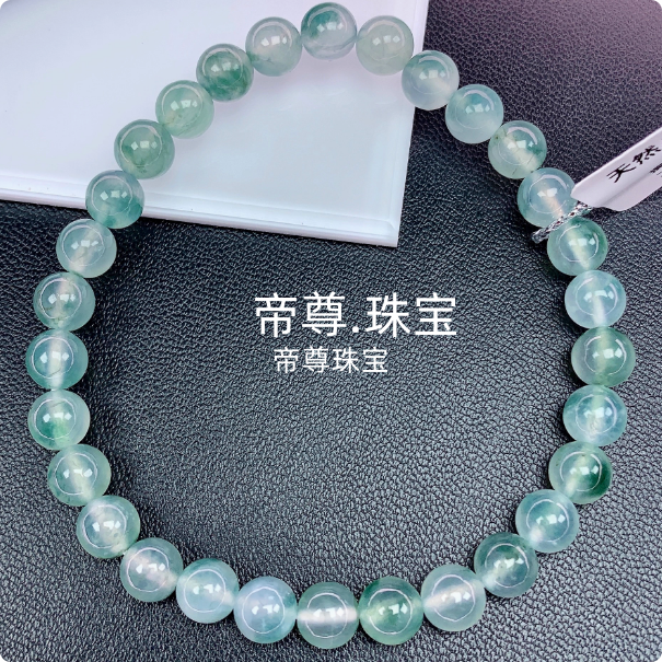 白冰种飘蓝花圆珠子玉石手串
