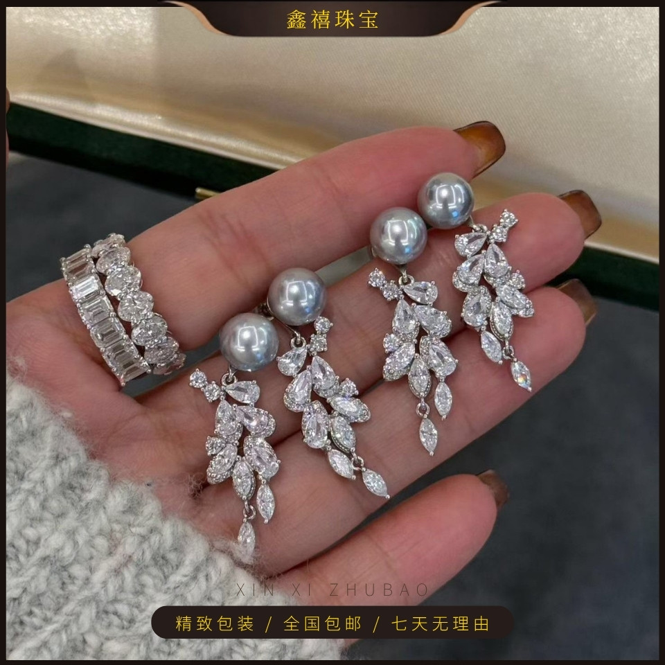 天然海水真多麻珍珠雀翎耳环