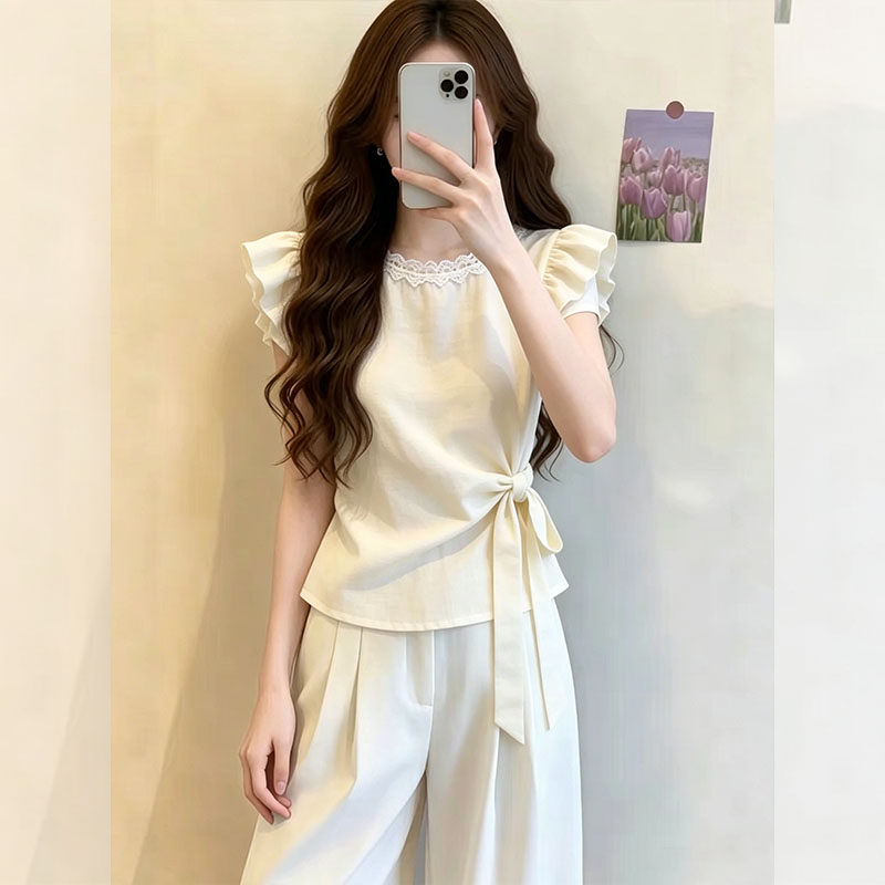 白色蕾丝领气质荷叶边绑带衬衫女图片