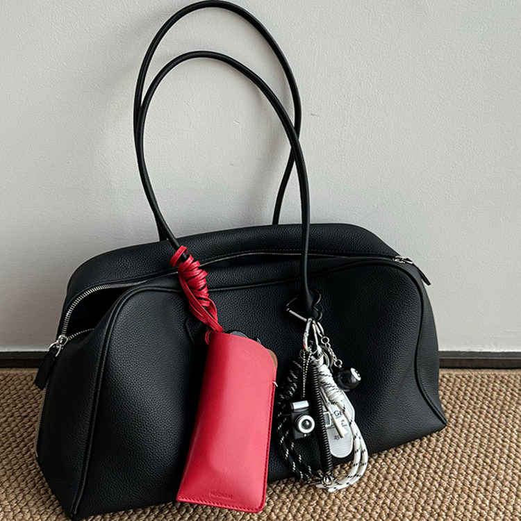 黑色真皮大容量托特包包女式2025新款轻奢小众高级感单肩波士顿包,箱包皮具/热销女包/男包,托特包,淘宝优惠券,粉丝福利购,淘宝优惠卷