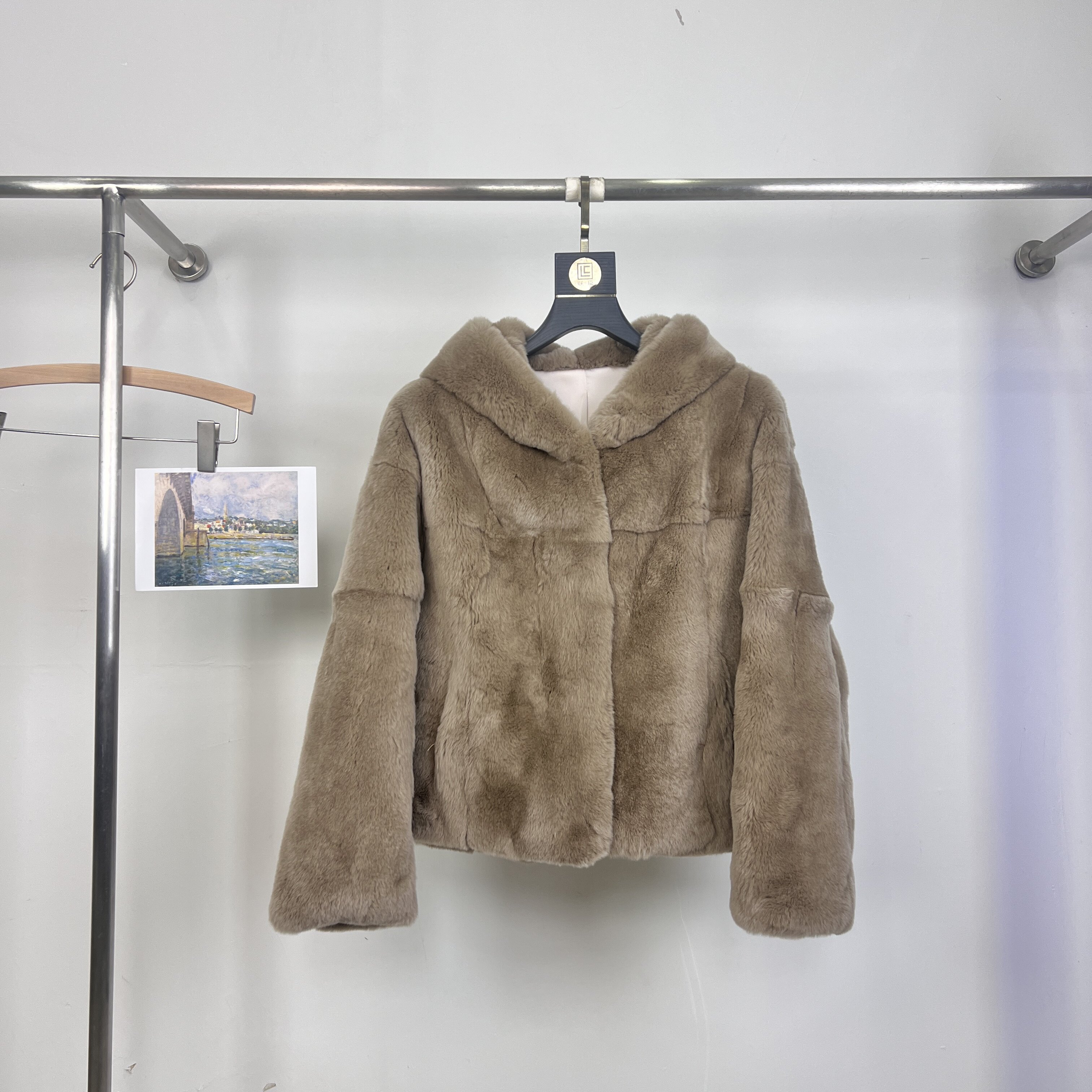 米米设计毛真毛皮草年轻款连帽女大衣加厚保暖皮草DD 001