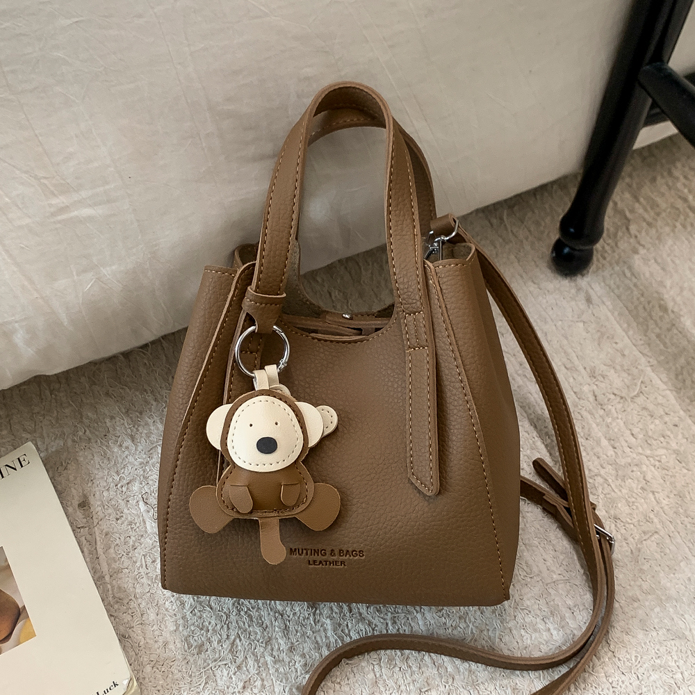 日韩风小水桶包女手提斜挎包