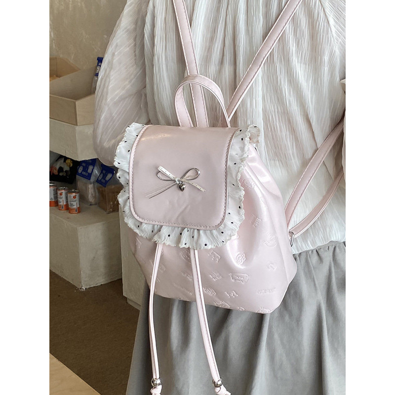 柔雾粉色甜美少女双肩包女2026新款珍珠蝴蝶结花边水桶包旅行背包