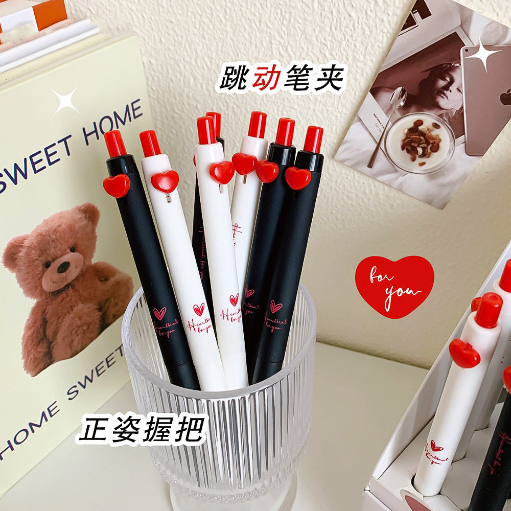 尤美2912芯动信号跳跳笔创意学生文具高颜值爱心按动中性笔黑