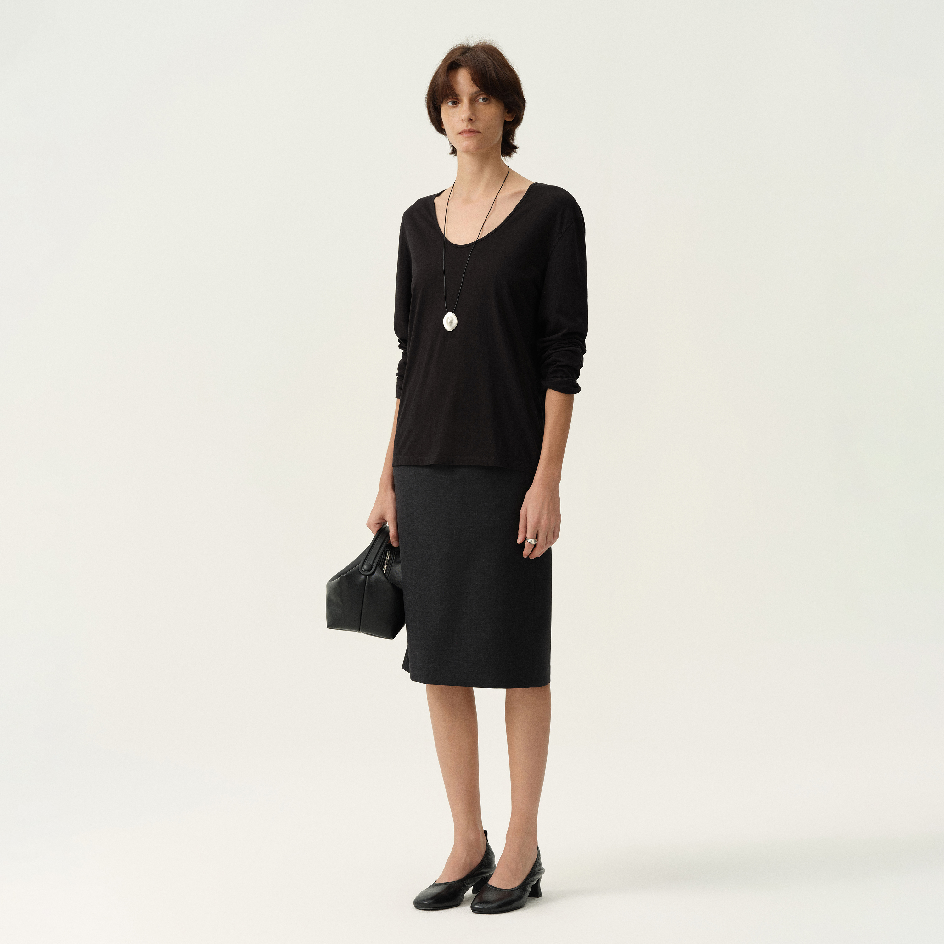 白弓通勤羊毛开叉小黑裙