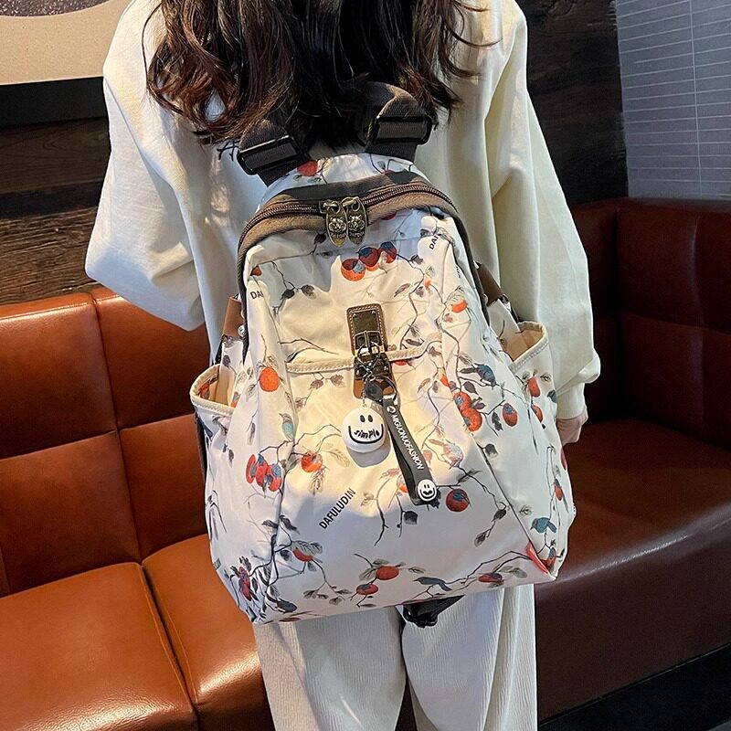 代购浅色双肩包2026新款潮大容量休闲女包多功能牛津布斜挎背包