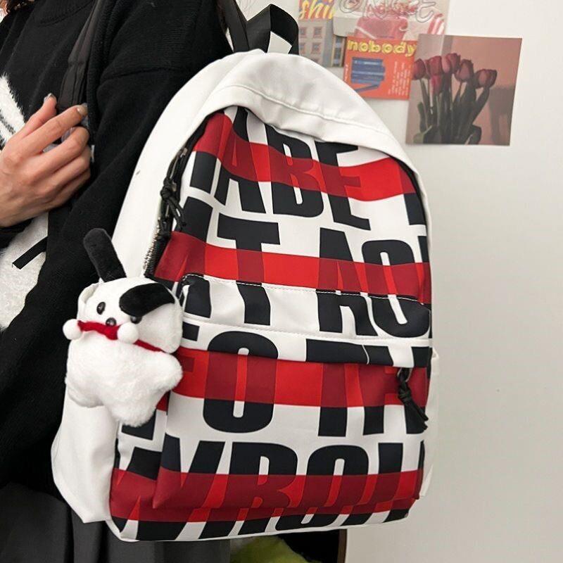 美式高街书包2025新款后背包女生学生小众印花背包潮流男女双肩包