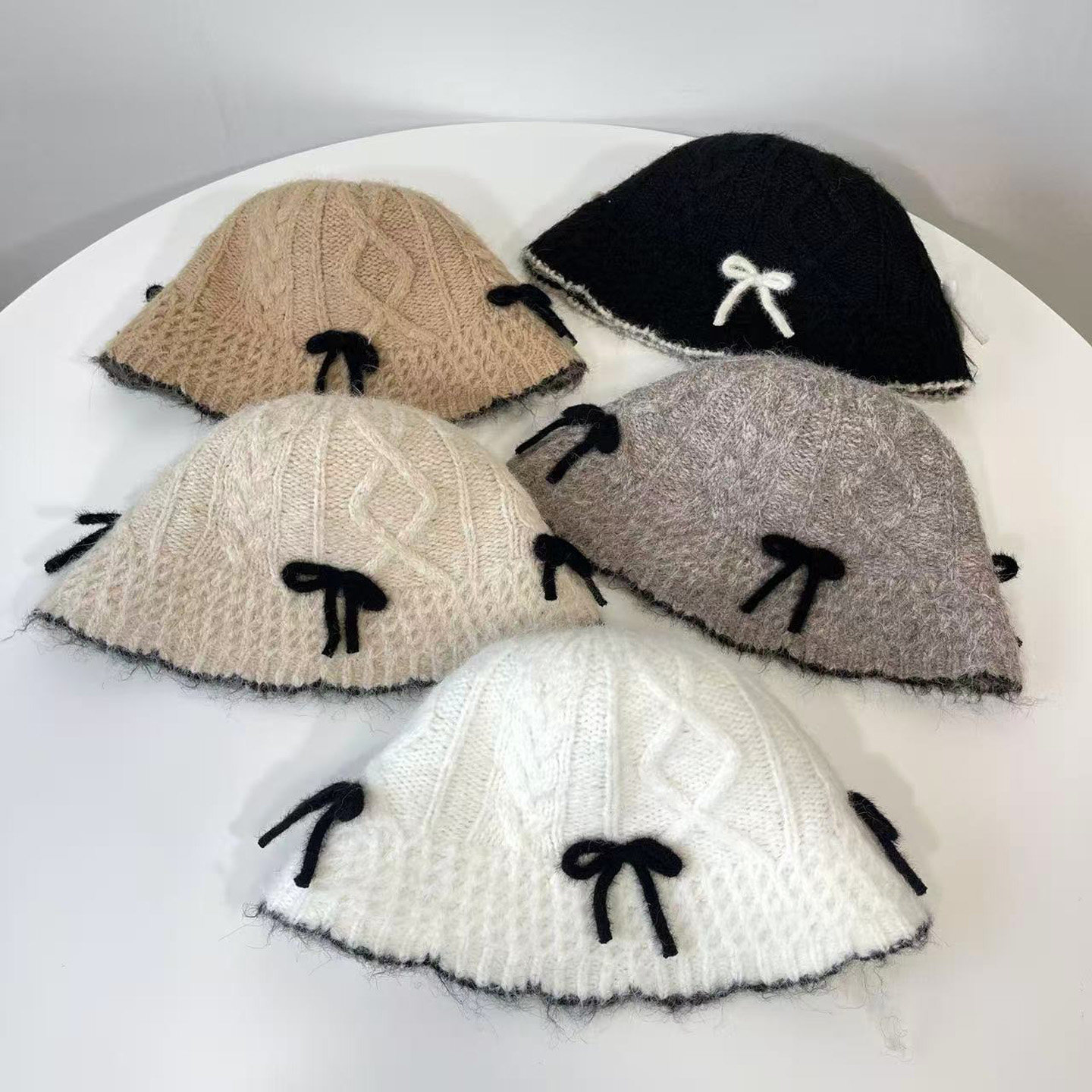 25年秋冬新款蝴蝶结渔夫帽女韩国东大门代购羊毛混纺麻花纹盆帽潮