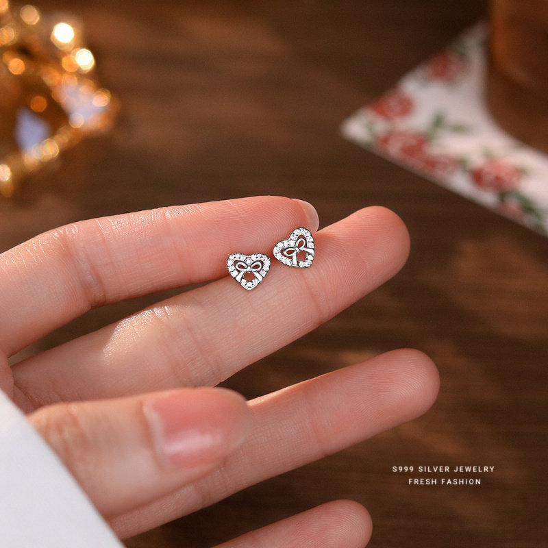 s999足银镂空爱心蝴蝶结耳钉女新款纯银轻奢时尚百搭甜美微镶耳饰