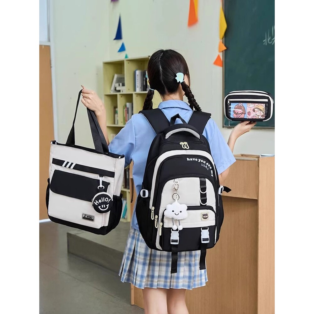 超大容量初中生书包女生高中学生轻便防水简约小学3-6年级双肩包