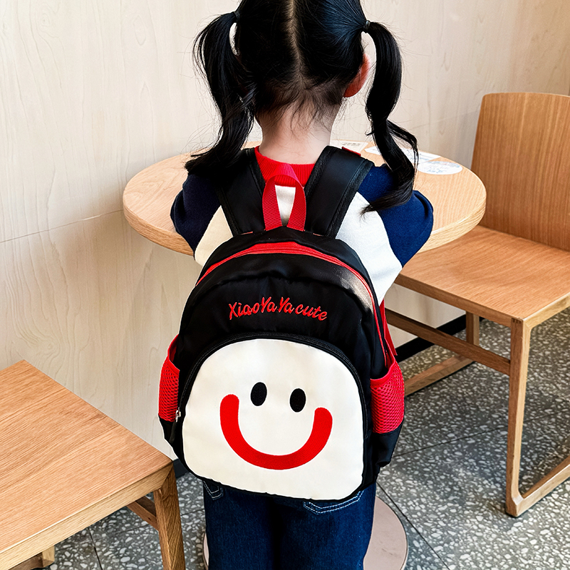 可爱儿童双肩包女童宝宝幼儿园轻便书包韩版新款男孩时尚笑脸背包