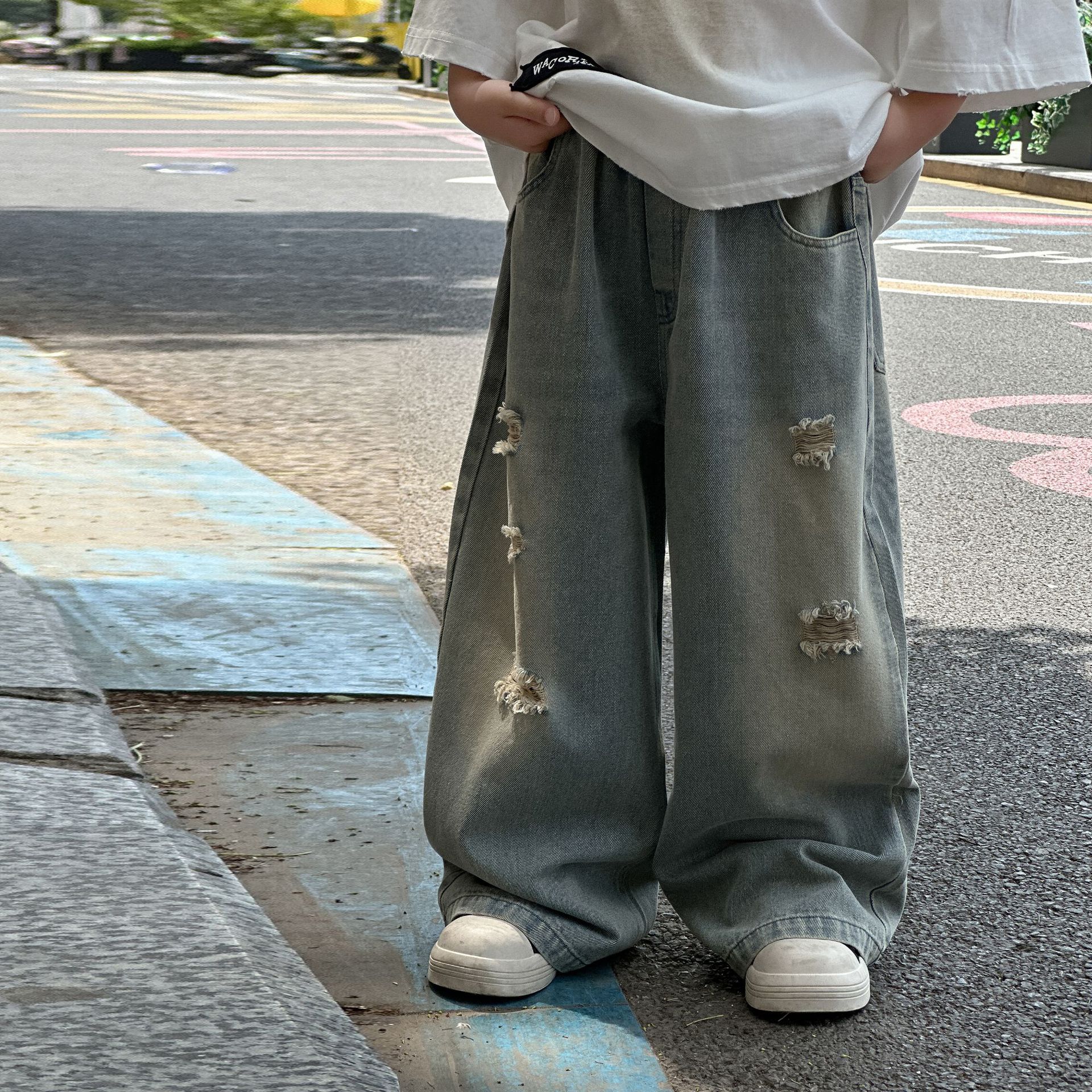 男童秋季韩版牛仔裤2025新款春秋儿童简潮水洗宽松阔做旧破洞腿裤