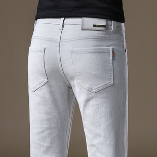 2025新款高端品牌米灰色牛仔裤男韩版修身小脚秋冬厚款休闲裤子男
