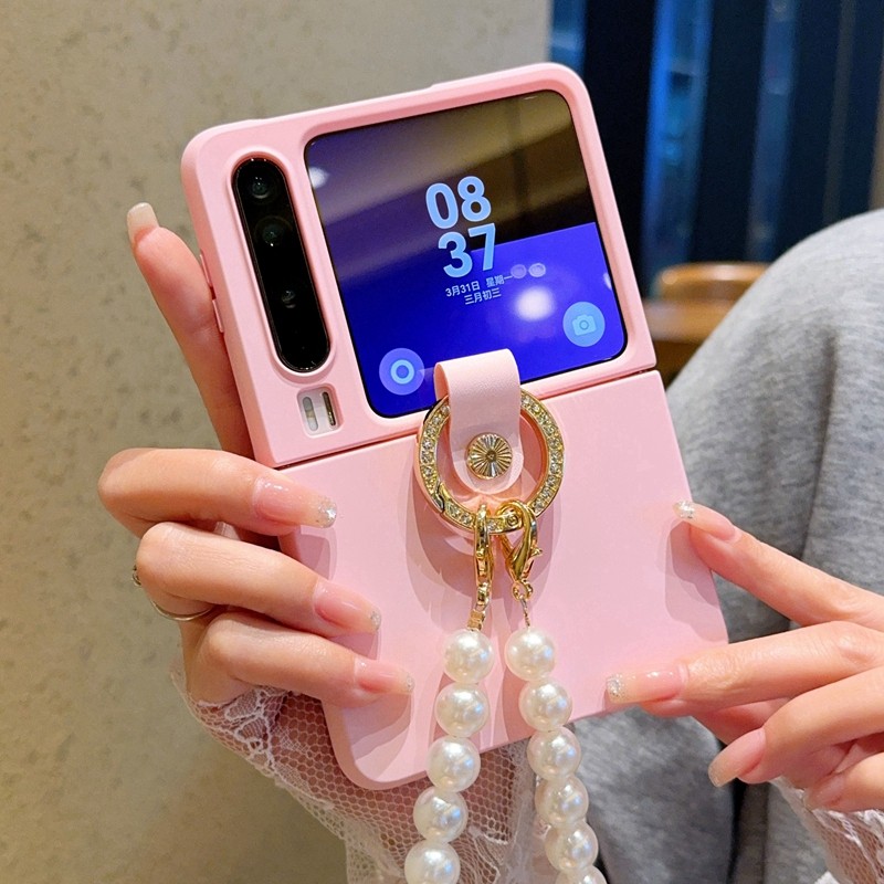 适用于华为PuraX手机壳创意肤感粉闪钻指环扣华为PuraX典藏版手提细珍珠手链女款新款全包防摔皮纹硬壳