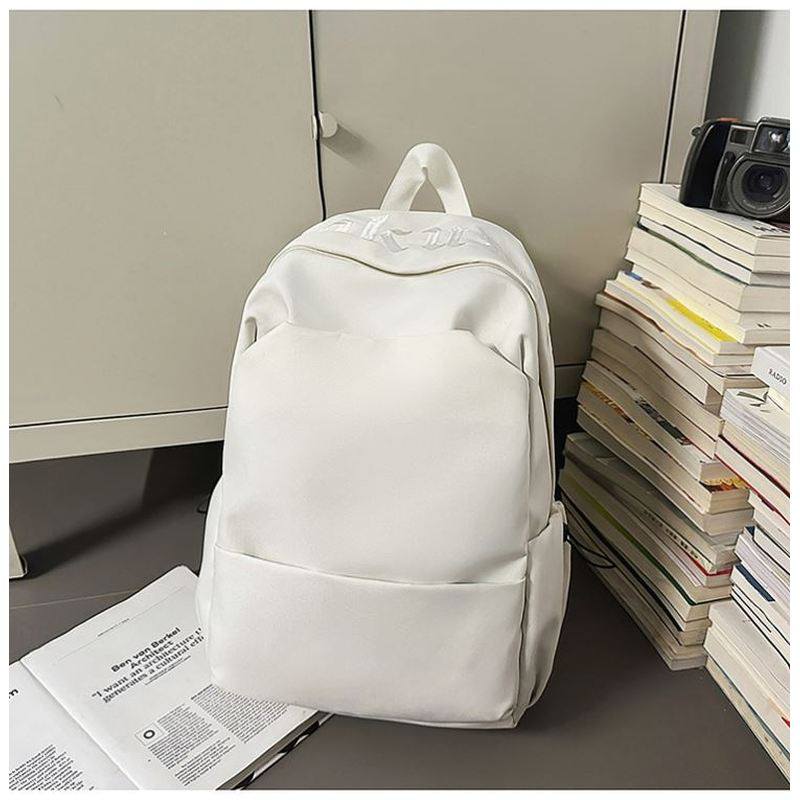 书包男大学生简约小众设计感高颜值双肩包男生高中生初中生背包女