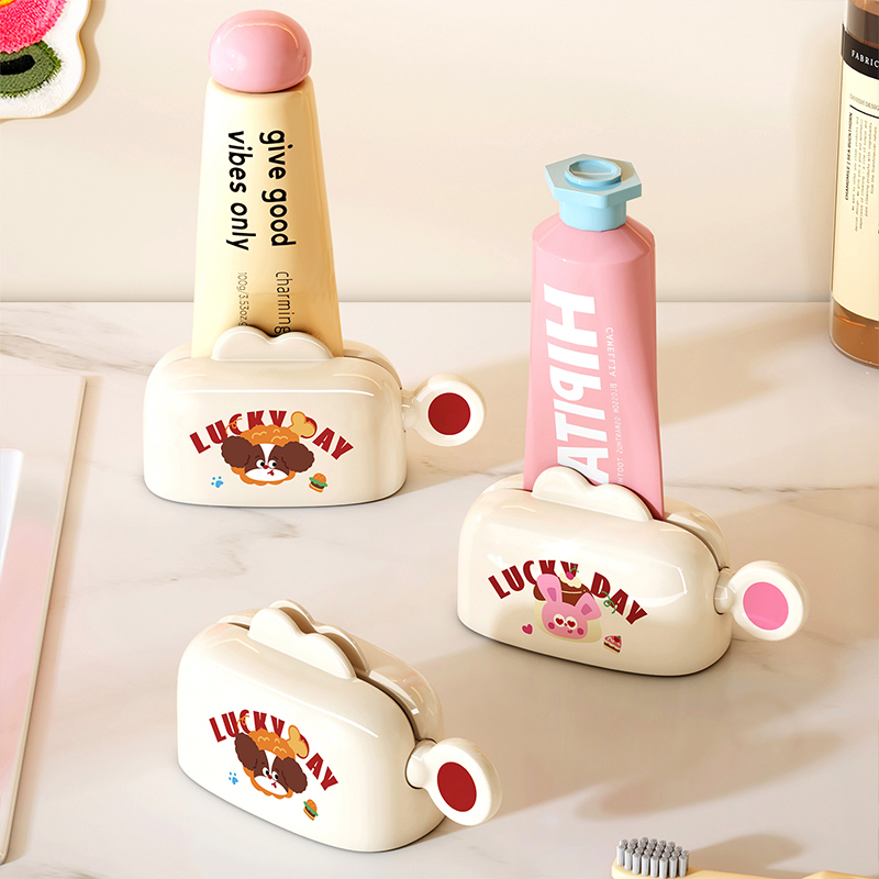 2025新款挤牙膏器卫生间磁吸壁挂式儿童牙膏洗面奶小样挤压器