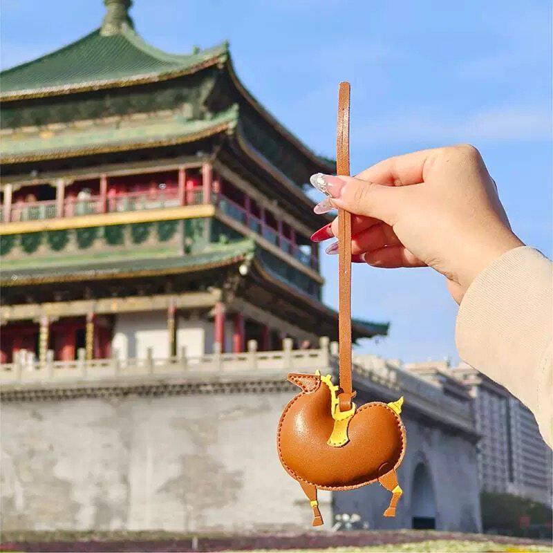 西安文创唐富贵正品皮马挂件包配