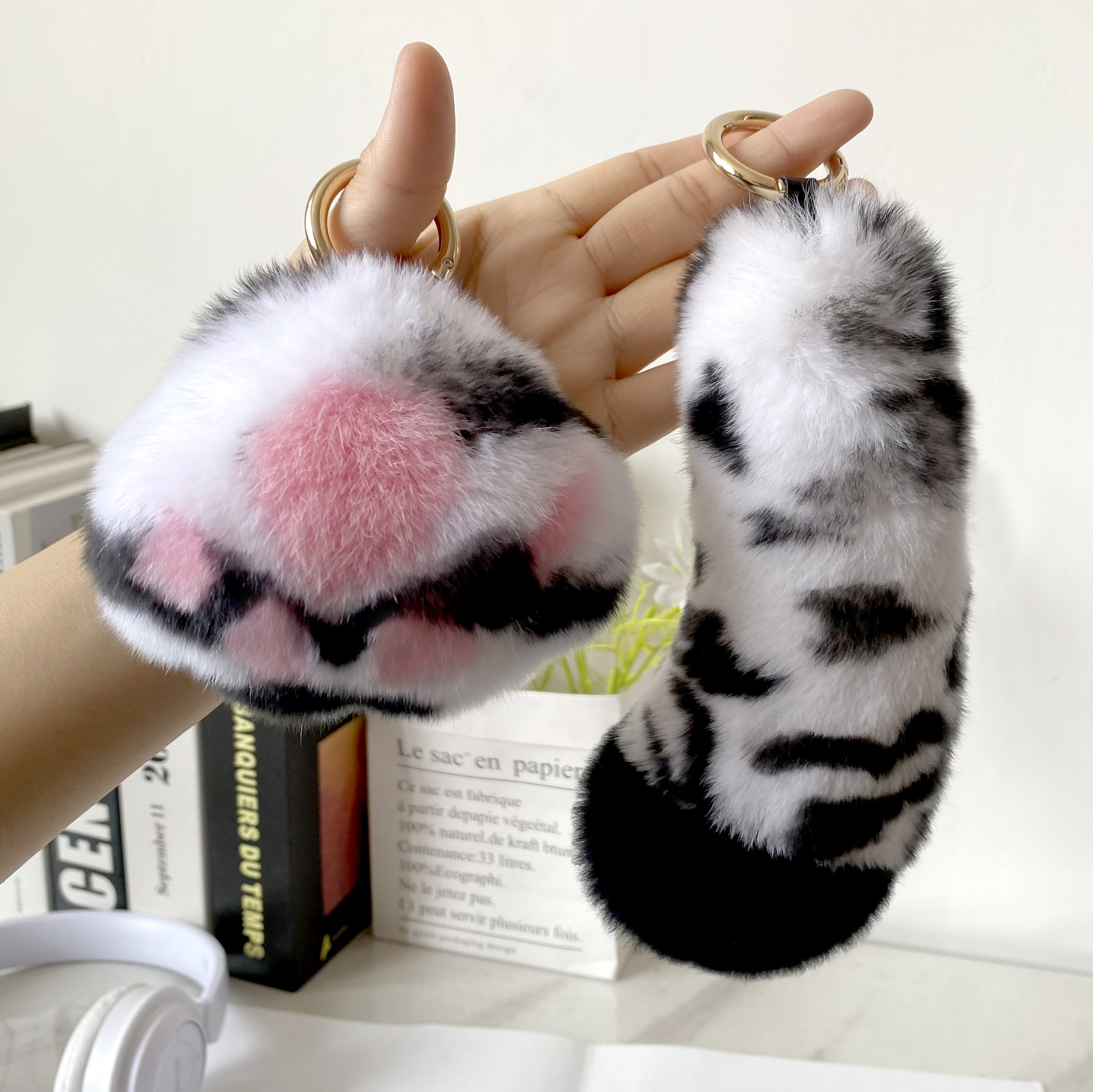 雪豹真獭兔毛款尾巴挂件毛绒包包挂饰汽车钥匙扣可爱豹爪创意配饰