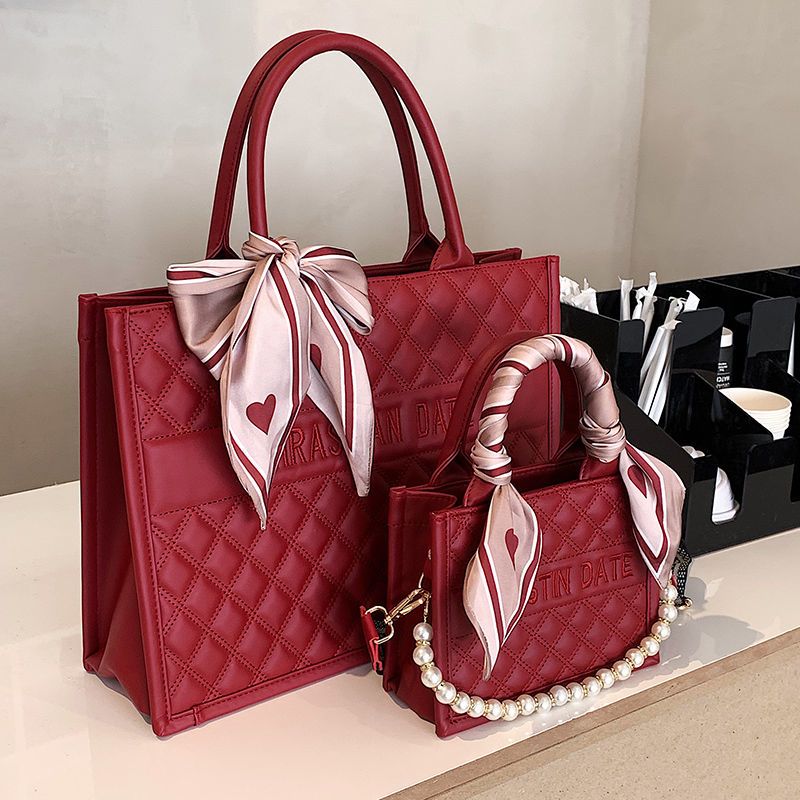 红色包包女大容量2025新