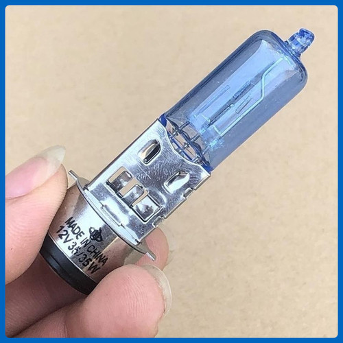 新款摩托车通用前大灯超亮灯泡双爪12V疝气灯泡白光款35W一体灯光