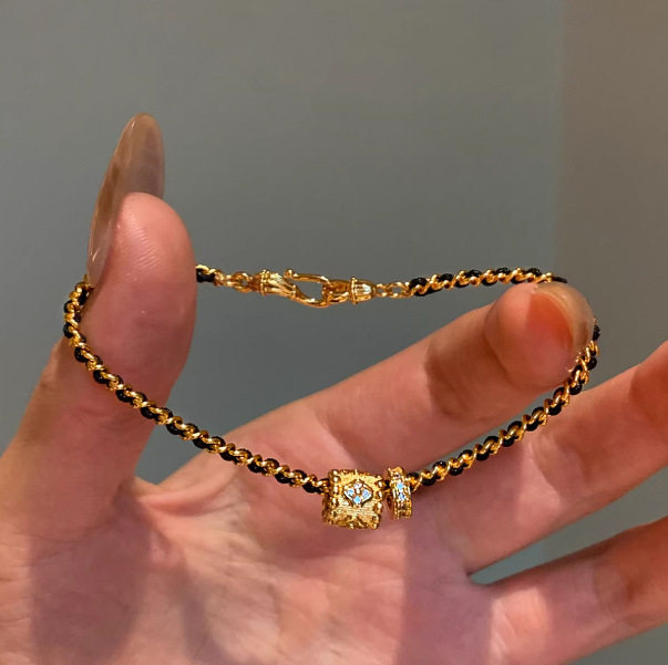 【特价】爆款925纯银中古香风编织黑金手链女编绳新款万花筒小蛮
