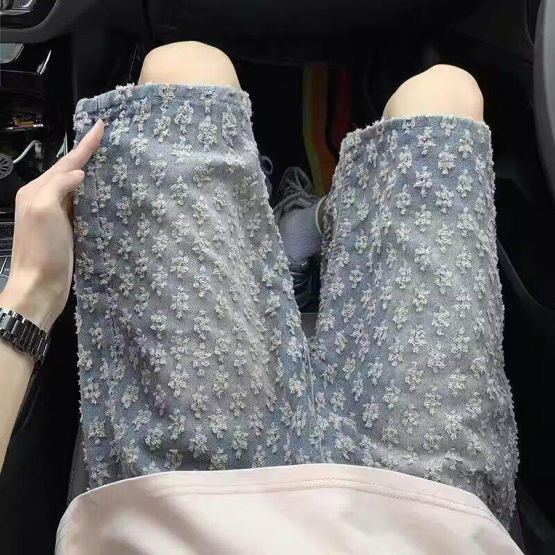 童装浅蓝色满印提花牛仔裤男款中大童痞帅炸街裤子美式高街微喇裤