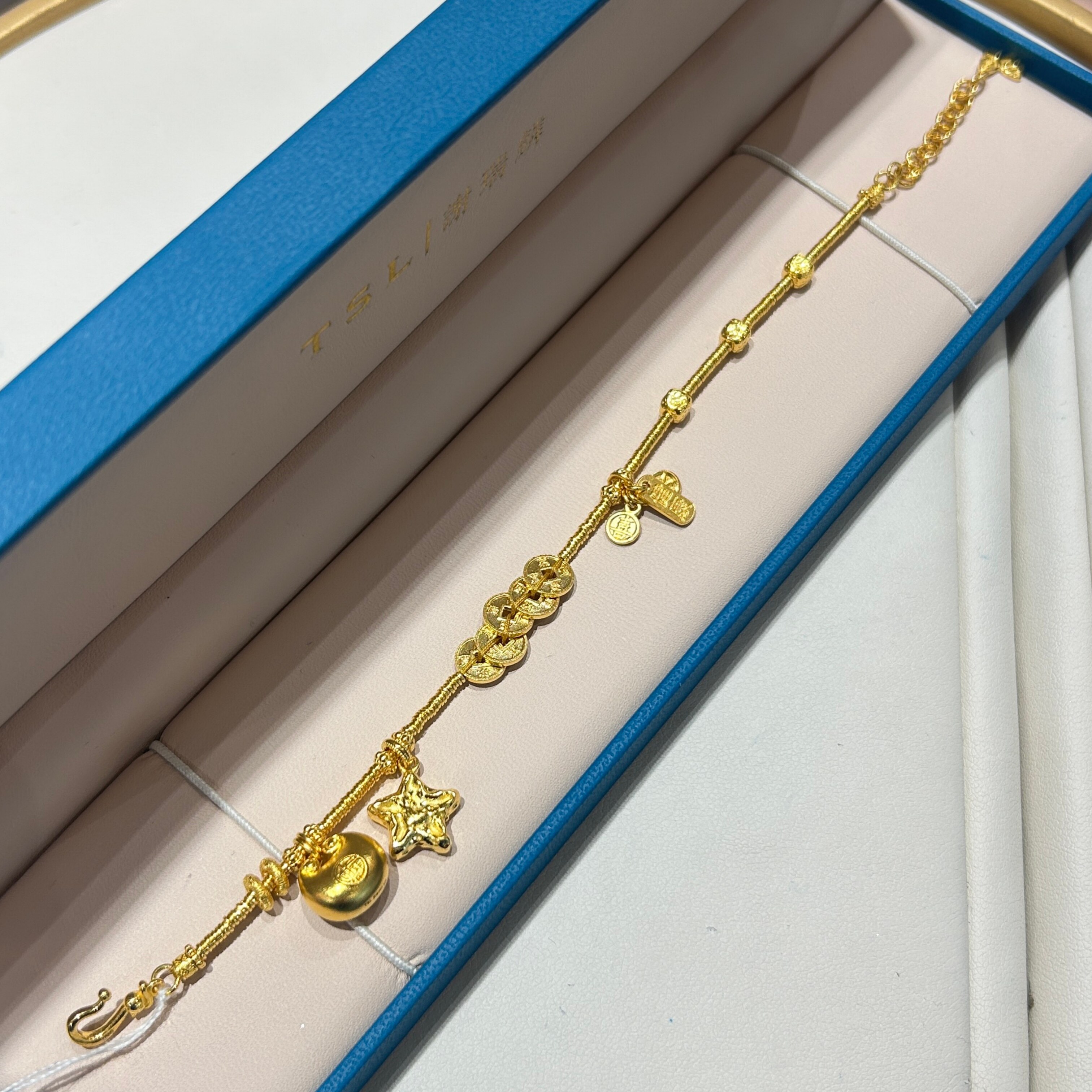 TSL谢瑞麟代购 足金999小福袋星星五帝钱黄金手链手串女 专柜正品