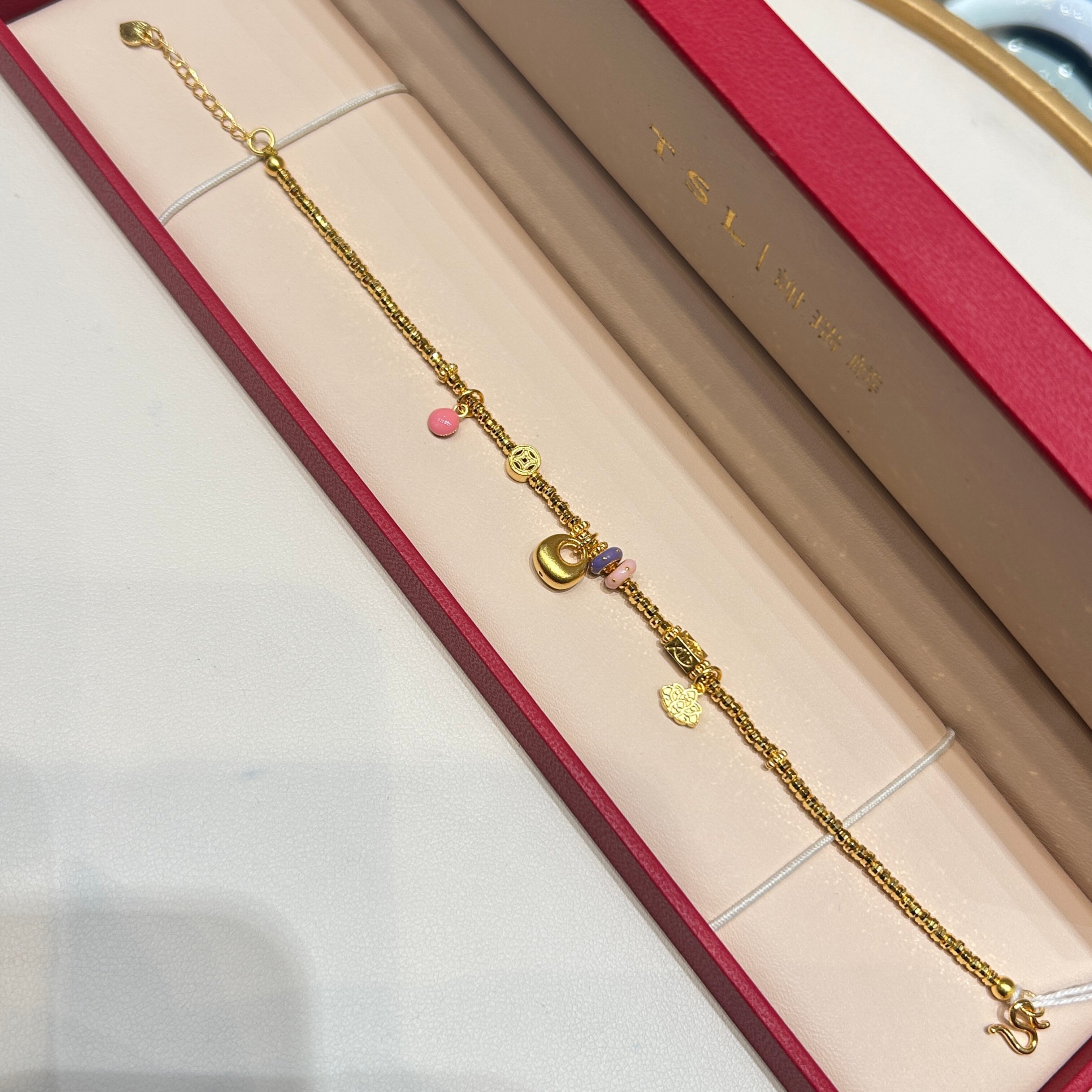 TSL谢瑞麟代购 足金999小福袋钱币碎金金黄金手链手串 专柜正品图片