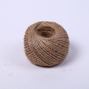 Bake a birthday cake with hemp string around it and wrap a m